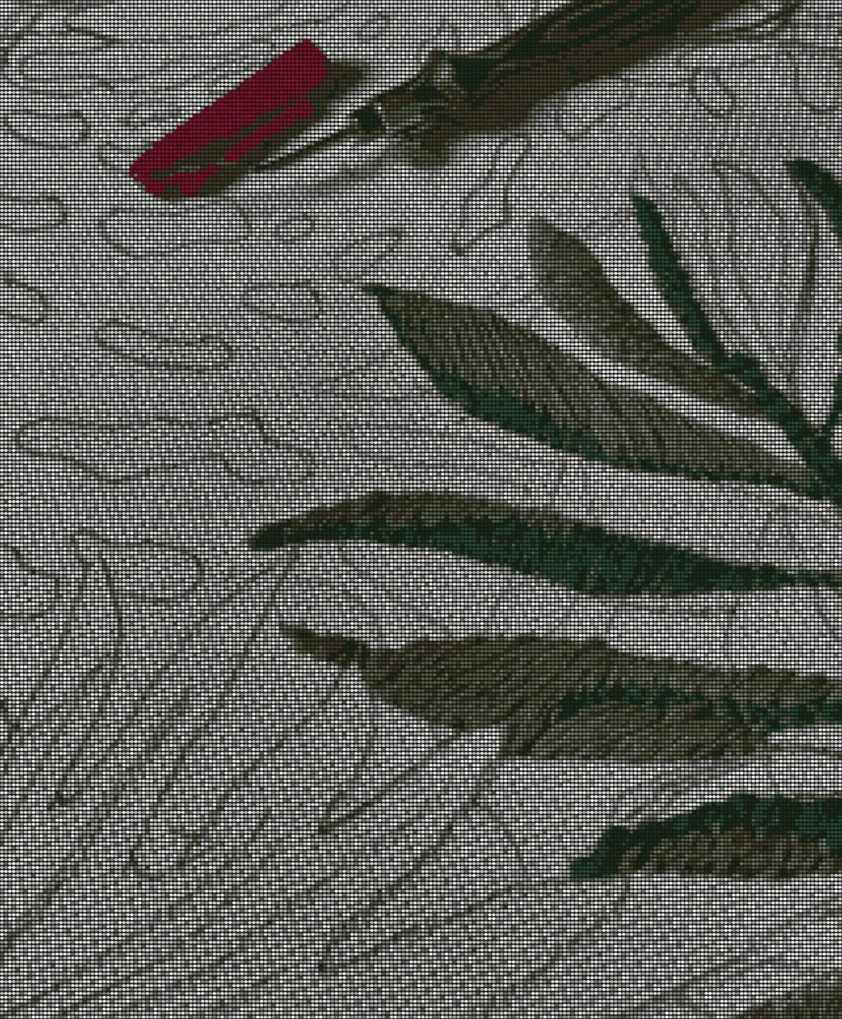 Green palm leaf being punched