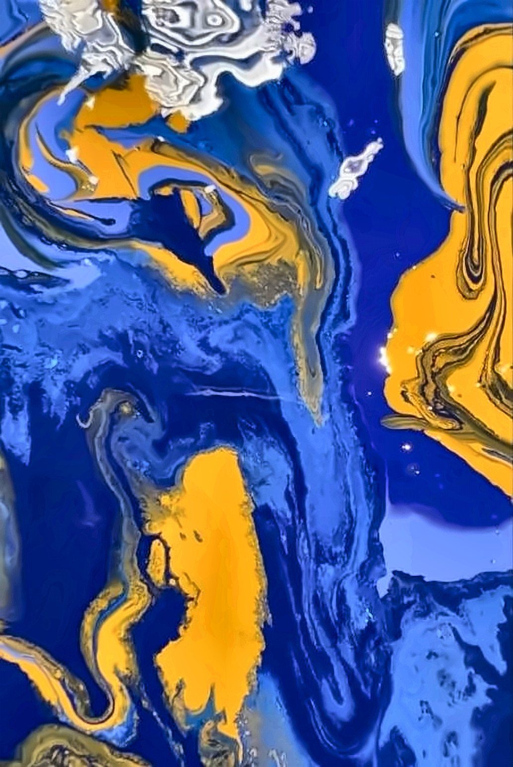 Cobalt and ochre fluid marbling